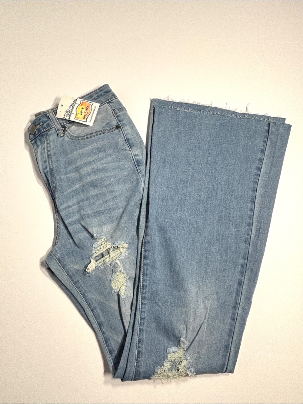 Easel Los Angeles NWT Size S Distressed Flare Jeans Light Wash Raw Hem PLS READ